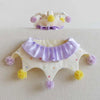 Polka dot pet jester collar and matching hat with purple ruffle and yellow pom poms