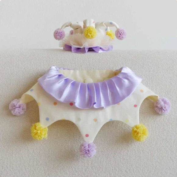 Polka dot pet jester collar and matching hat with purple ruffle and yellow pom poms