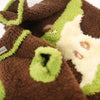 Brown and green fluffy pet sweater with soft texture and abstract pattern, close-up view